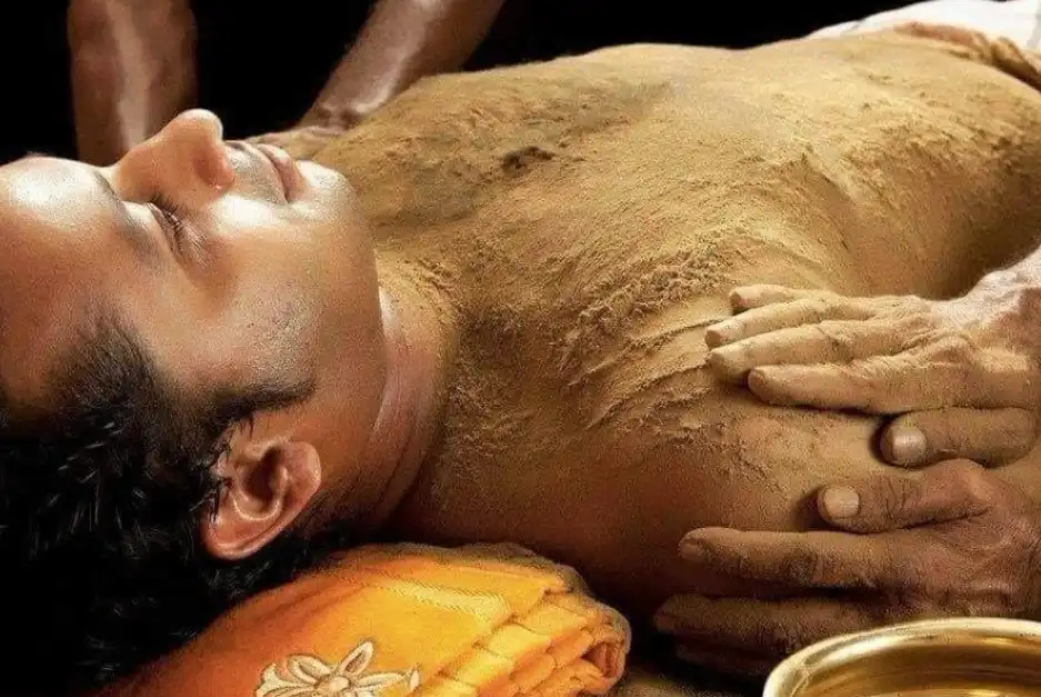 Udhwarthana (Powder massage)